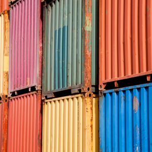 sides of shipping containers in primary colors